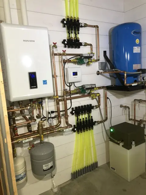 Combi-boiler and manifold installation